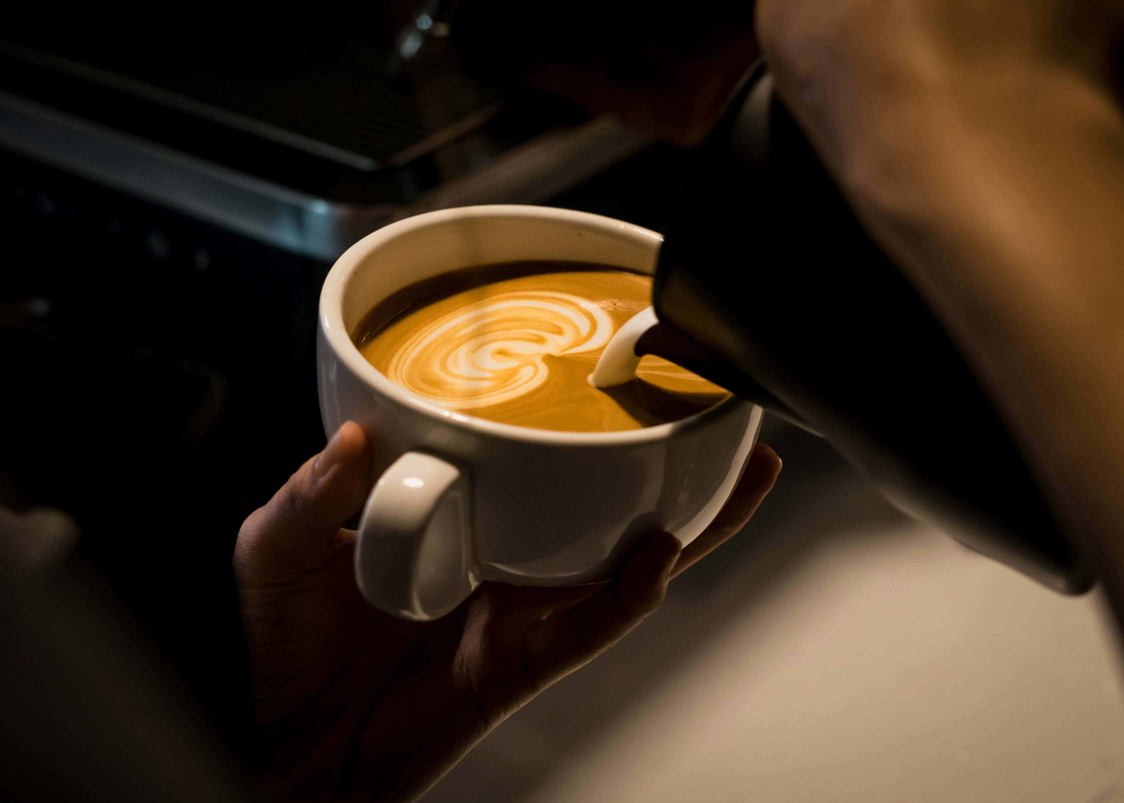 barista making coffee